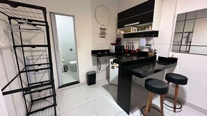 Microwave, stovetop, coffee/tea maker, cookware/dishes/utensils