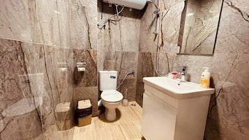 Shower, free toiletries, towels, soap