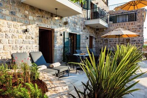 Deluxe Suite, Pool View | Terrace/patio