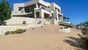 A modern multi-story house with a flat roof, large windows, and a balcony. - 100 mile views! 6000 sq ft 4-bedroom house, salt pool in fabulous Fountain Hills (Fountain Hills)