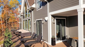 Enormous deck full length of the house, with ample furniture and gas fireplace. Direct gas connection, no need to deal with propane tanks.