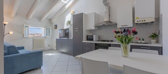 GuestHost - Comfortable apartment located on the second floor of a building NOT equipped with a lift.In 63 m2 of space it comfortably accommodates 5 people with a double sofa bed in the living room, a double bedroom and a bedroom with a single bed.Locate