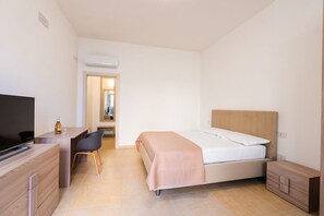 1 chambre, fer et planche à repasser, Wi-Fi, literie fournie