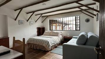 Family Quadruple Room, Garden View | 1 bedroom, individually decorated, individually furnished, desk