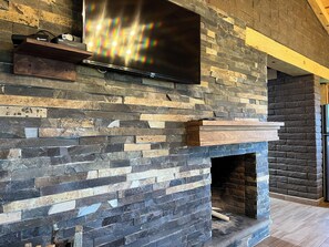 Family Cabin | Living area | 40-inch flat-screen TV with cable channels, fireplace