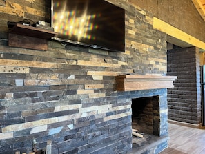 Family Cabin | Living area | 40-inch flat-screen TV with cable channels, fireplace