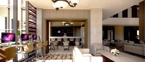 A modern hotel lobby with a bar area, seating arrangements, and a visible chef in the background.