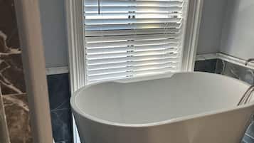 Shower, towels, soap, shampoo