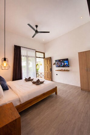 Habitación superior | Camas Select Comfort, escritorio y espacio para trabajar con laptop 