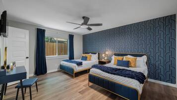 4 bedrooms, desk, iron/ironing board, travel crib