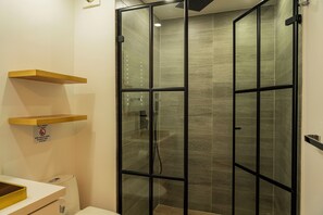 Shower, hair dryer, towels, soap