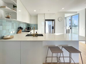 Fridge, microwave, oven, stovetop - Beautifully Appointed: Sophisticated, Steps From the Sand (Sunshine Coast)