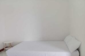 Free WiFi, bed sheets - OYO 94070 The Cozzy Exclusive Syariah (Bandar Lampung)