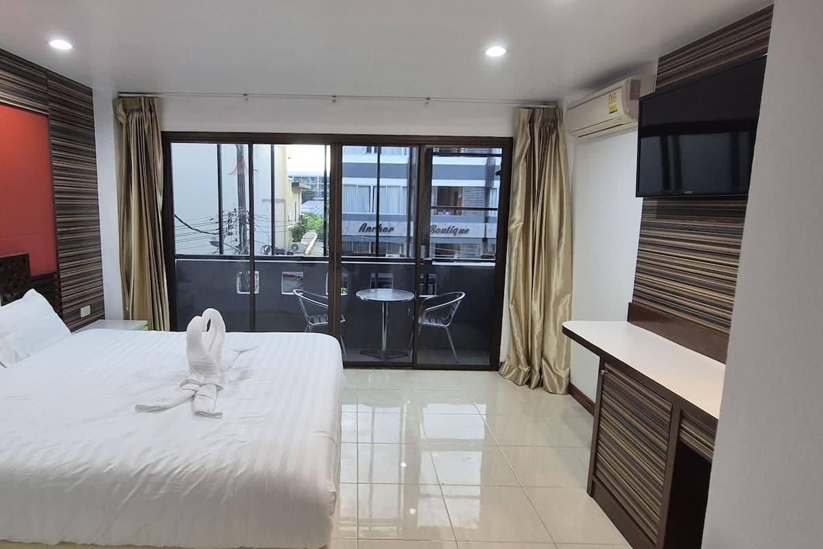Habitación doble Deluxe | Espacio para trabajar con laptop, wifi gratis y ropa de cama