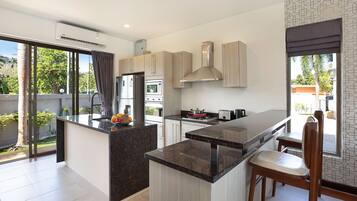 Design Villa, 3 Bedrooms, Garden View | Private kitchen | Electric kettle, dining tables