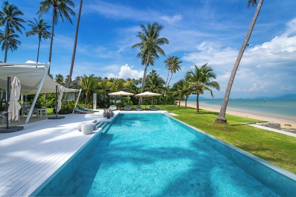 Outdoor pool, pool umbrellas, pool loungers