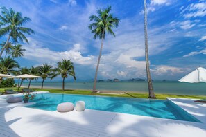 Outdoor pool, pool umbrellas, pool loungers
