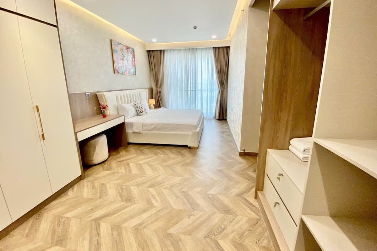 Grand Condo, Balcony, City View | Desk, iron/ironing board, free WiFi