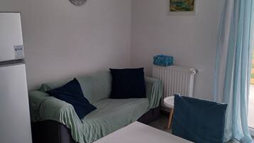 Apartment (FreeMe Apartment - One Bedroom Apartm) | Living room | 32-inch flat-screen TV with digital channels