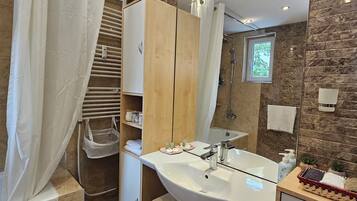 Hair dryer, towels, soap, shampoo