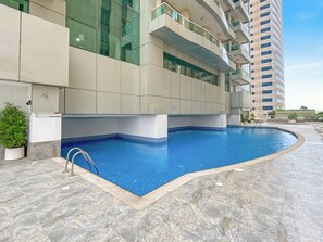 Outdoor pool, a heated pool - Stunning 1BR Apartment close to Dubai Marina Walk (Dubai)