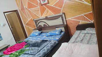 Desk, laptop workspace, free WiFi, bed sheets