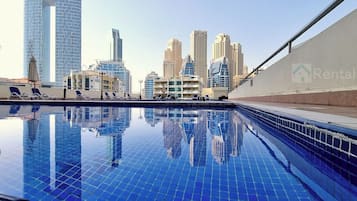 Outdoor pool, open 10:00 AM to 6:00 PM, pool umbrellas, sun loungers