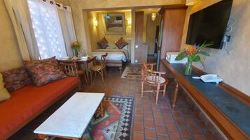 Executive Studio Suite, Balcony, Pool View | In-room safe, desk, laptop workspace, soundproofing