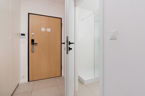 Apartment, 1 Bedroom, Balcony | Bathroom | Shower, free toiletries, hair dryer, towels