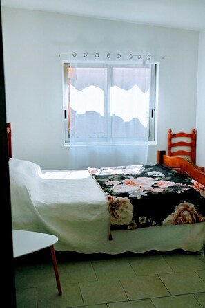 2 dormitorios, tabla de planchar con plancha, wifi y ropa de cama