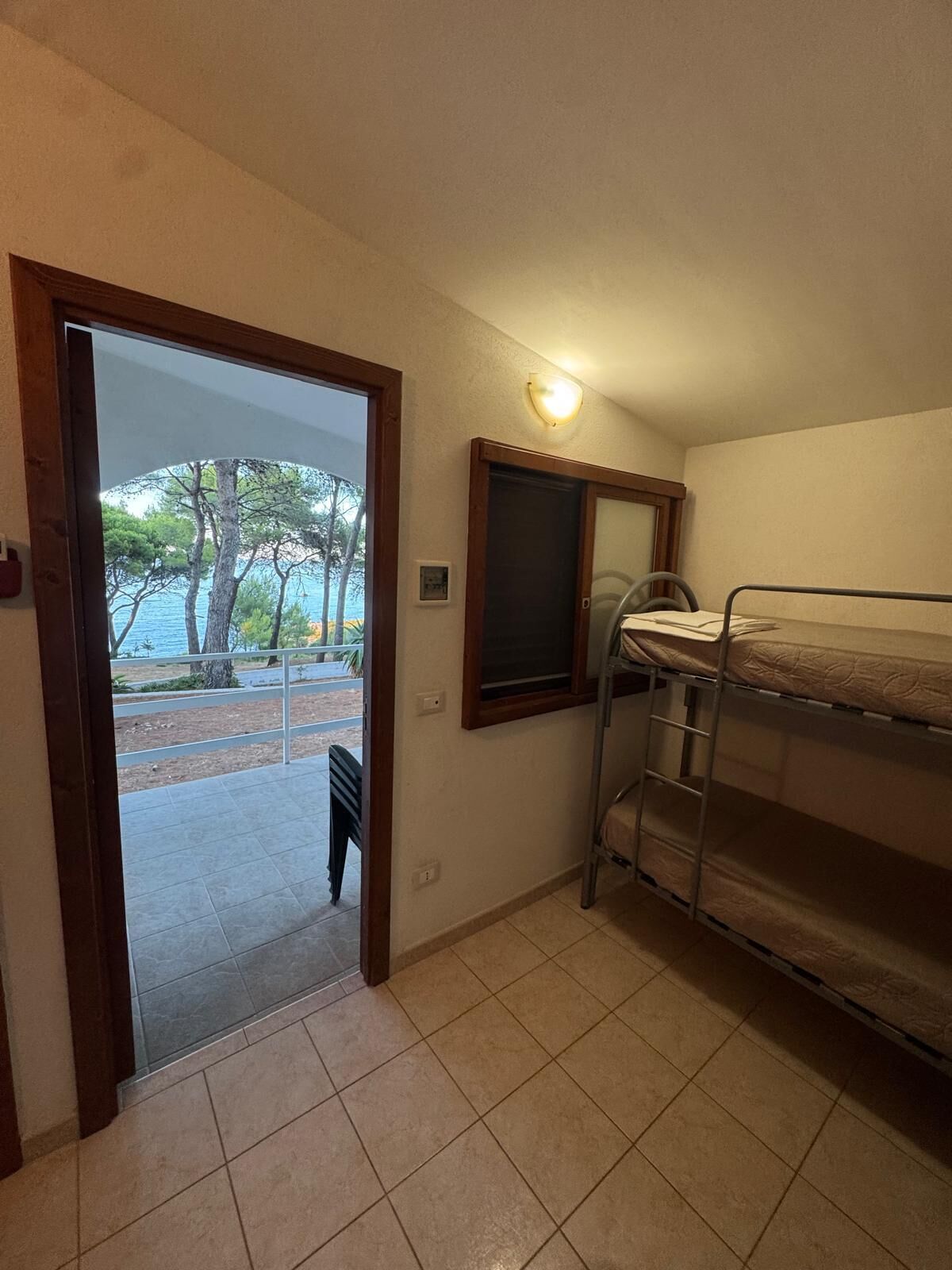 Condo, Sea View | Living area | 24-inch TV with satellite channels