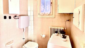 Hair dryer, towels, toilet paper