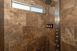 Shower, hair dryer, towels, soap