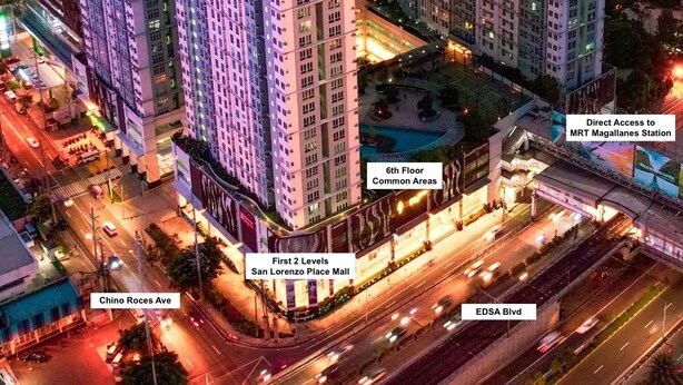 Een hoog gebouw met meerdere torens, gelegen nabij EDSA Blvd en Chino Roces Ave, met directe toegang tot MRT Magallanes Station.