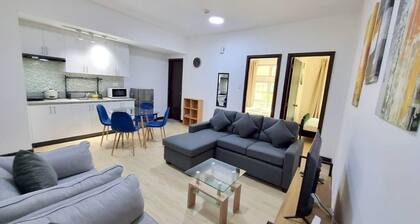 Cozy 2-Bedroom 2-Bath condo San Lorenzo Place Makati WiFi 4KM NAIA