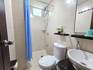 Shower, bidet, towels, soap