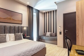 Classic Quadruple Room | Minibar, in-room safe, desk, laptop workspace - Neapolis Lifestyle (Naples)