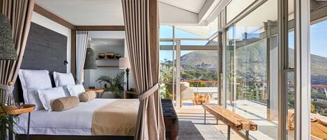 Suite Deluxe, vue ville | Coffres-forts dans les chambres, bureau