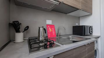 Apartment, Balcony | Private kitchen | Fridge, microwave, stovetop, espresso maker