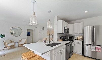 Beachside Modern Wellness Villa with Spacious Patio, Walk to the Beach