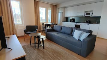 Standard Apartment, Balcony | Living area | Flat-screen TV