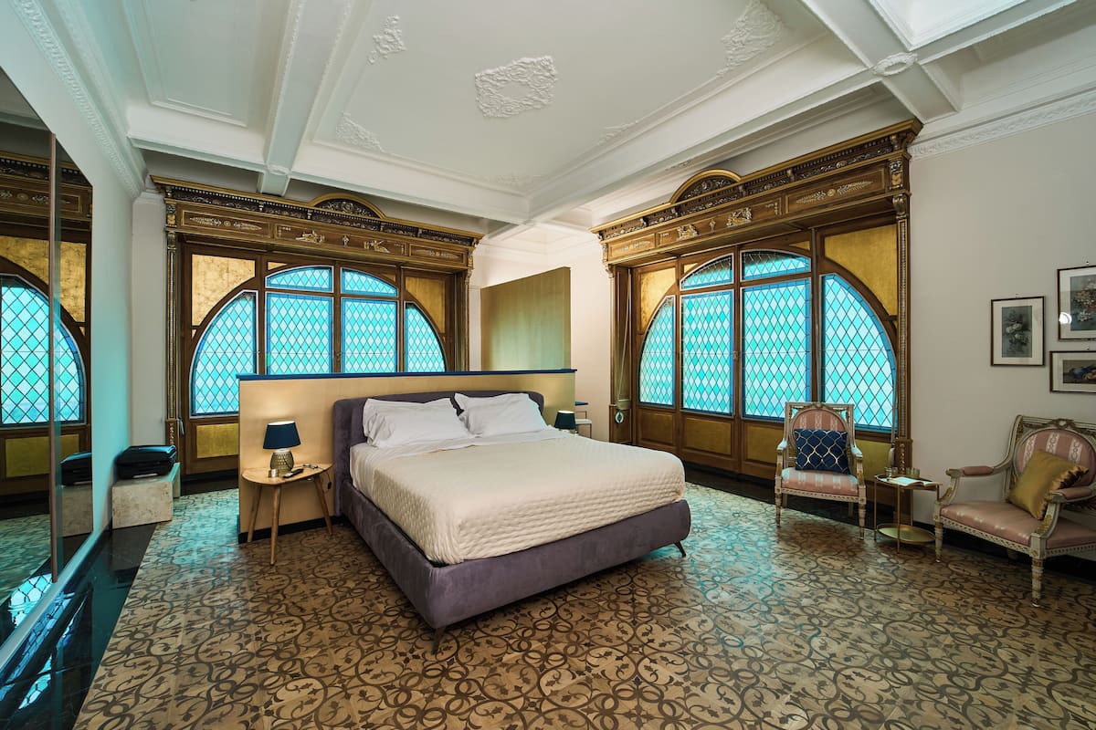 Luxury Suite, Balcony, City View | 1 bedroom, in-room safe, desk, laptop workspace