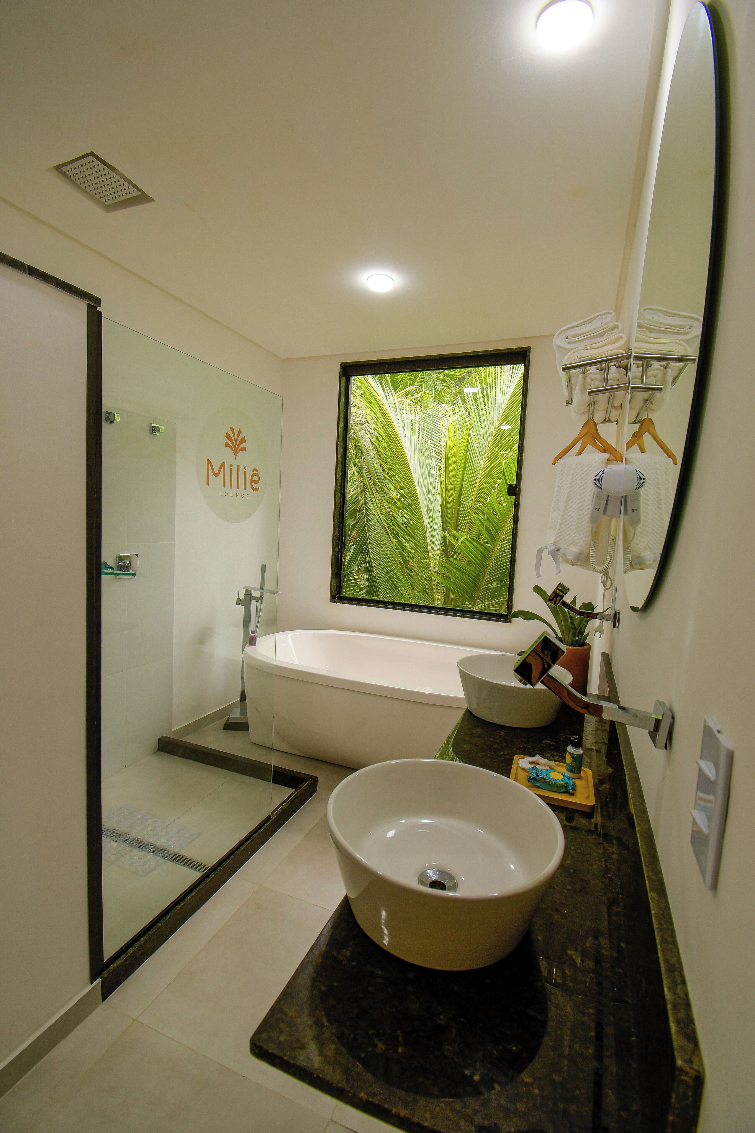 Executive Suite | Bathroom | Shower, rainfall showerhead, designer toiletries, hair dryer