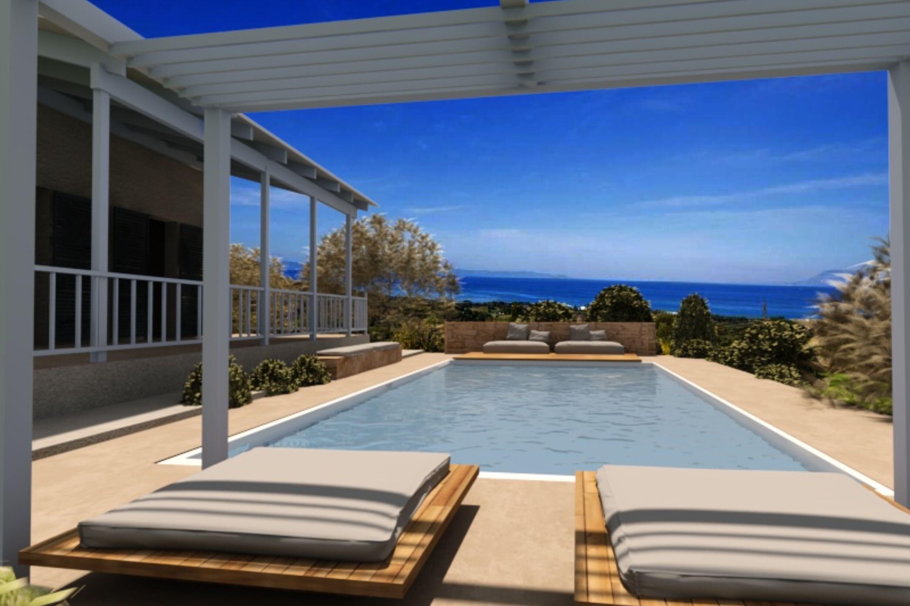 An infinity pool with two lounge chairs, a pergola, and a view of the ocean.