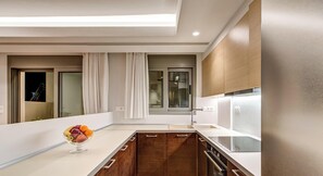 Oven, stovetop, cookware/dishes/utensils, dining tables - A3 - Luxury house with pool, Goutos Properties Porto Heli (Porto Heli)