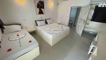 Tremannsrom – standard, terrasse | Sengetøy av topp kvalitet, minibar, safe på rommet og sengetøy