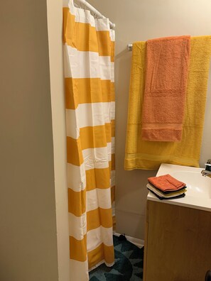Shower, towels, soap, shampoo