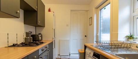 Een magnetron, een broodrooster