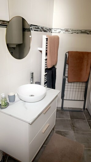 Hair dryer, towels, soap, shampoo