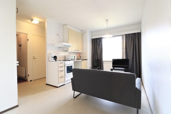 Standard Apartment | Living area | Flat-screen TV